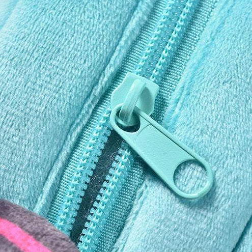 Close-up of Hatsune Miku plush pouch showing soft fabric and light blue zipper detail.