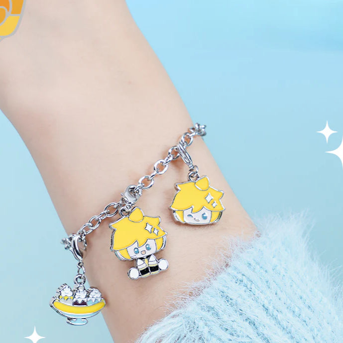 Silver charm bracelet featuring chibi Kagamine Rin faces and a dessert bowl charm