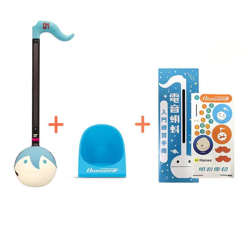Hatsune Miku Otamatone set with stand, stickers, and beginner’s guide.