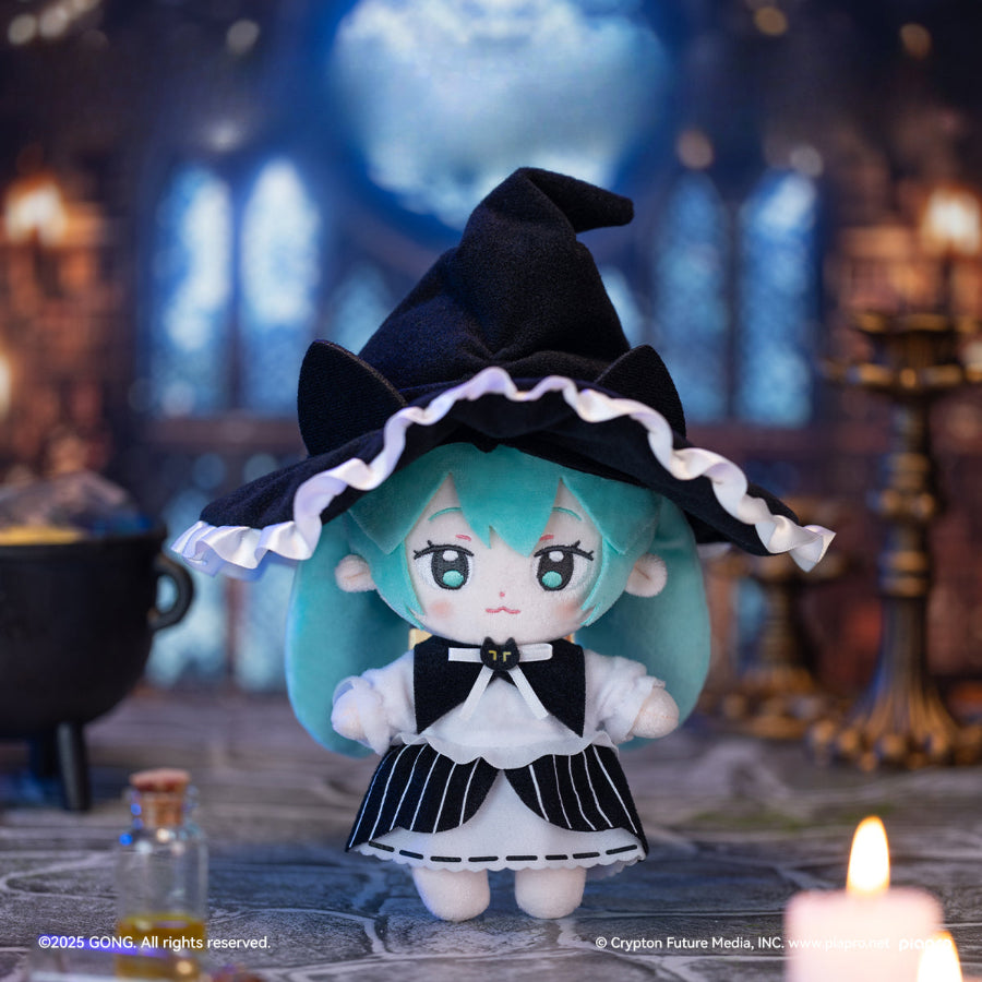 Hatsune Miku Halloween plush doll in black witch costume with striped skirt and big hat.