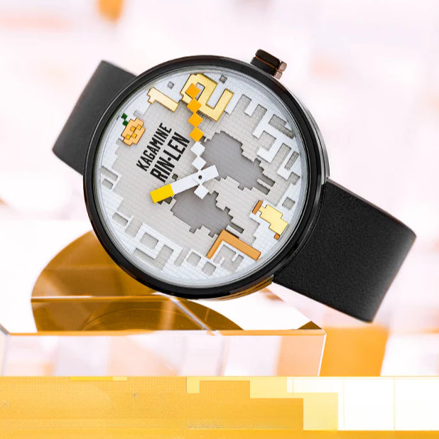 Kagamine Rin Len pixel-style watch with yellow numbers and twin silhouettes, black leather strap.