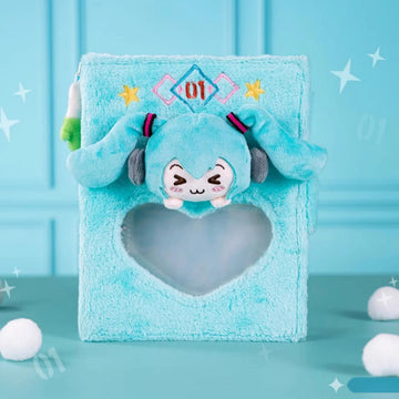 Front of plush Miku storage bag with heart window and chibi Miku face on top