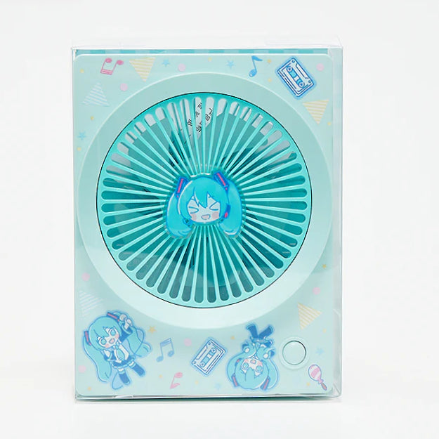 Front view of a Miku-themed mini fan with chibi illustrations and pastel retro decorations