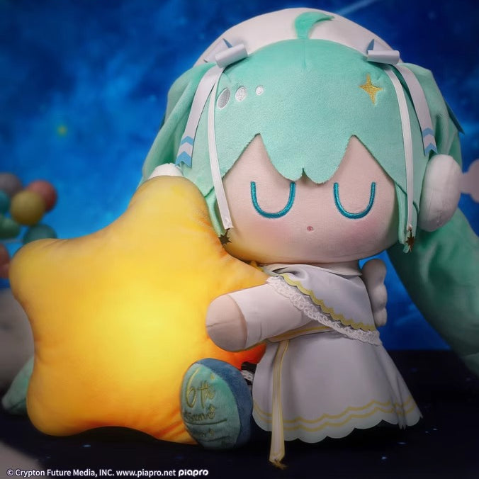 Hatsune Miku 6th-anniversary plush hugging a glowing star pillow in dreamy starry night outfit