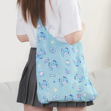 Girl wearing a cute pastel tote bag printed with Hatsune Miku faces and sweets
