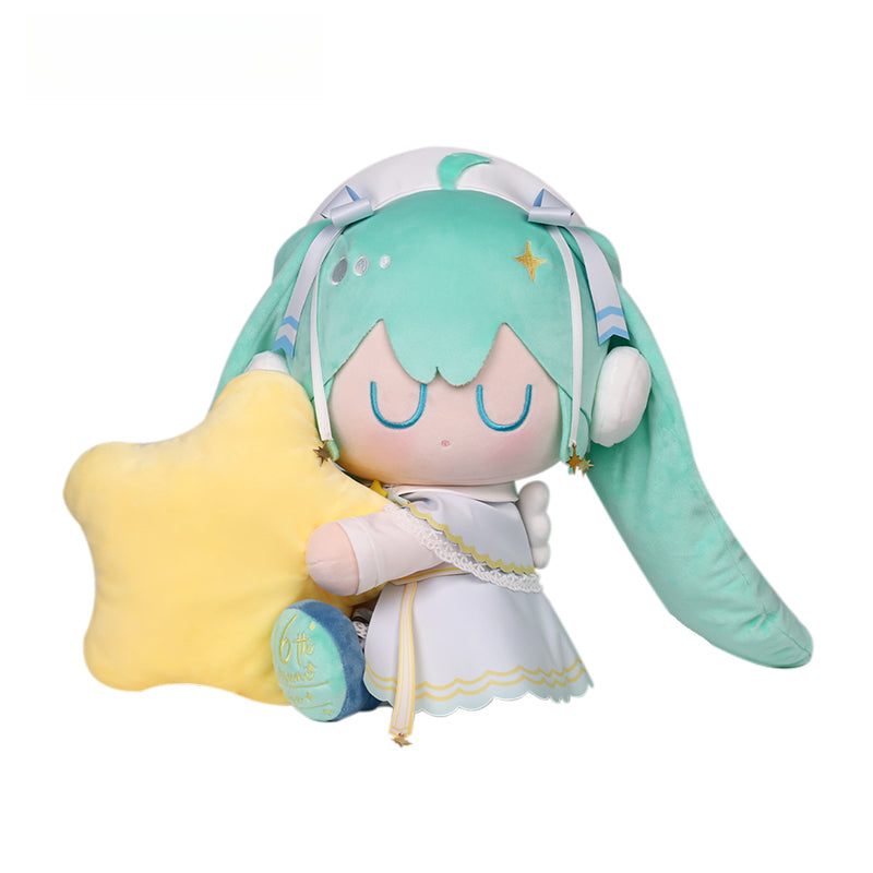 Hatsune Miku plush doll in star-themed outfit hugging a yellow star pillow, 6th anniversary design