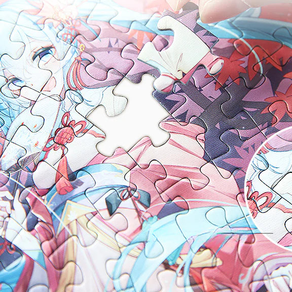Hatsune Miku puzzle close-up with one piece being placed into the board