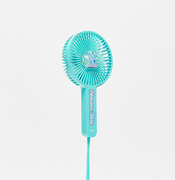 Miku-themed handheld fan with chibi design and logo on the handle
