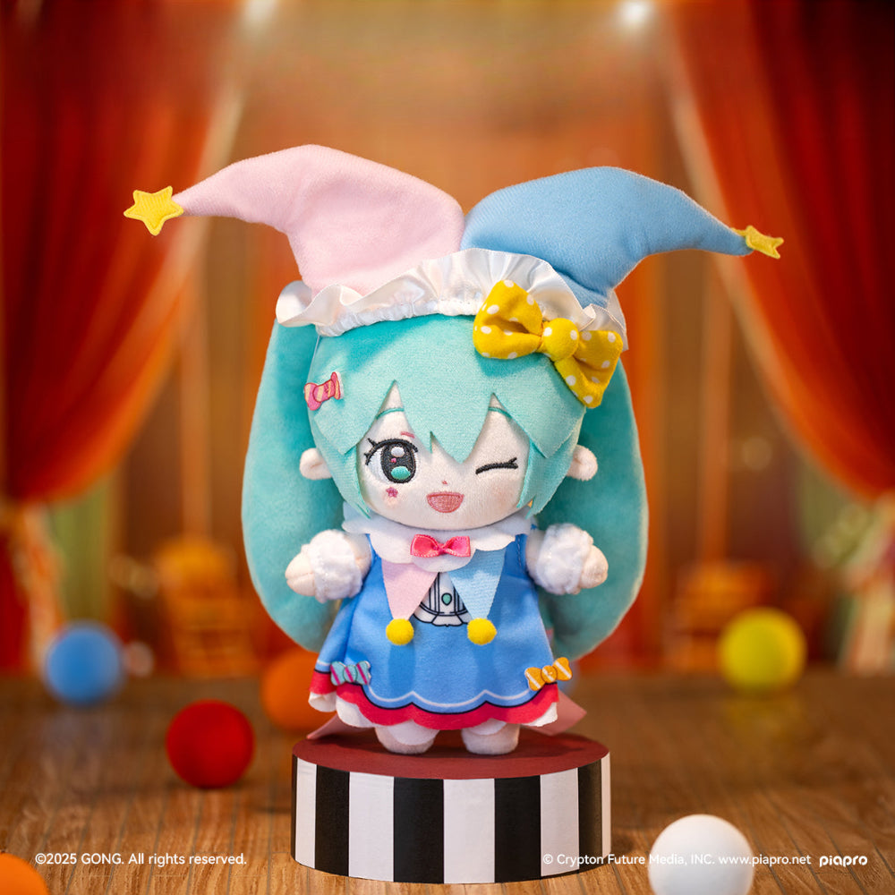 Hatsune Miku Halloween plush doll in jester outfit with star hat, standing on a circus stage.